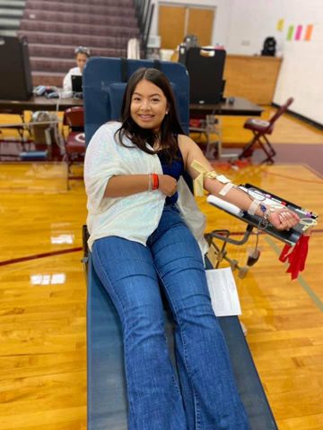Girl donating blood