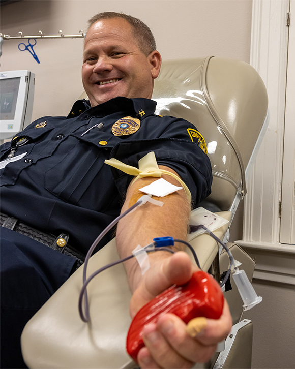 Fireman donating blood