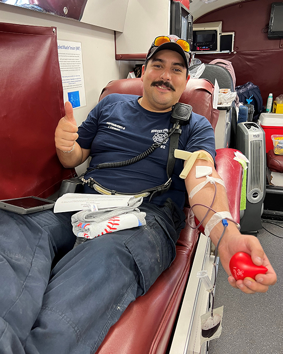Fireman donating blood