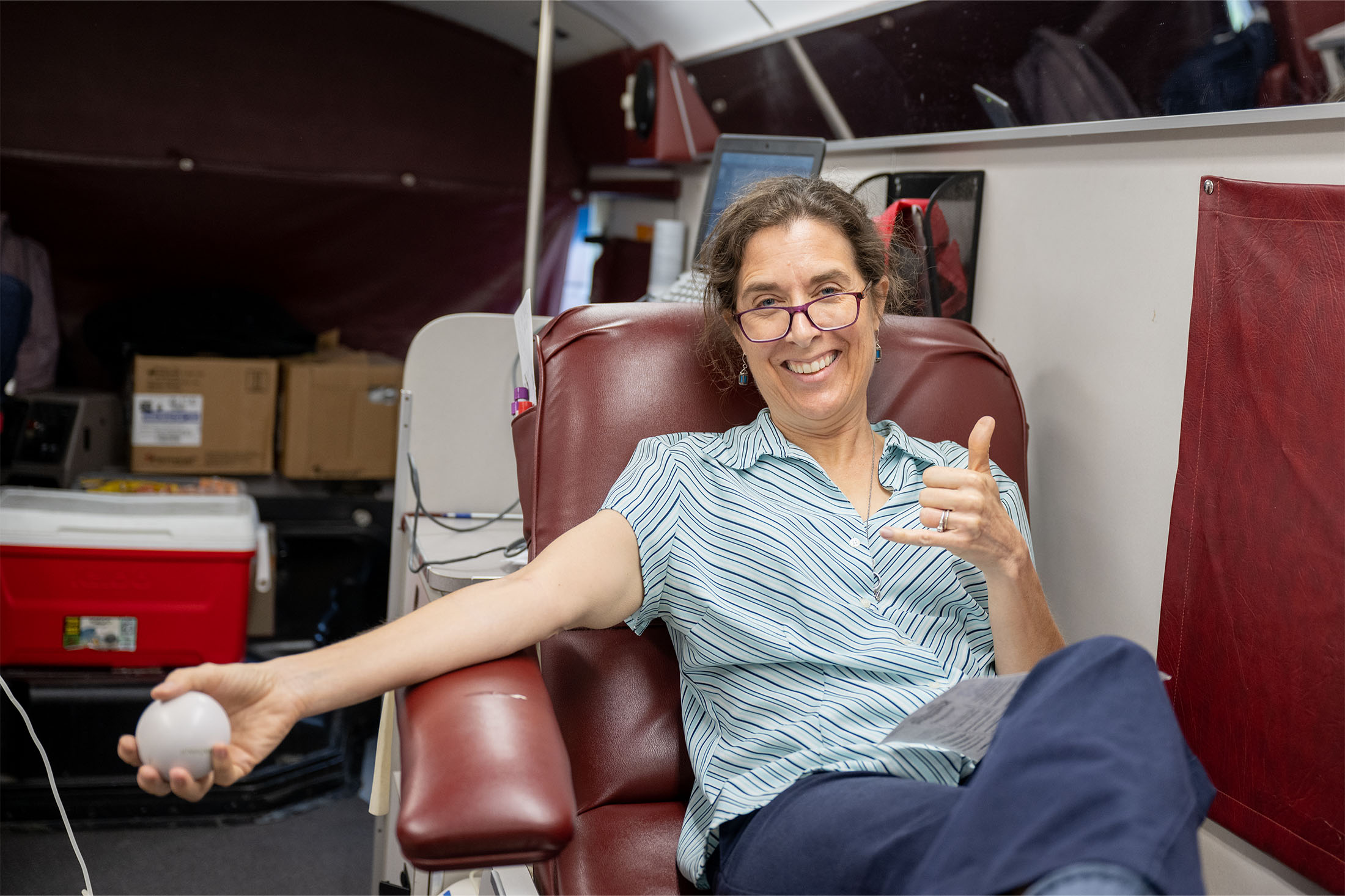 Adult woman donating blood