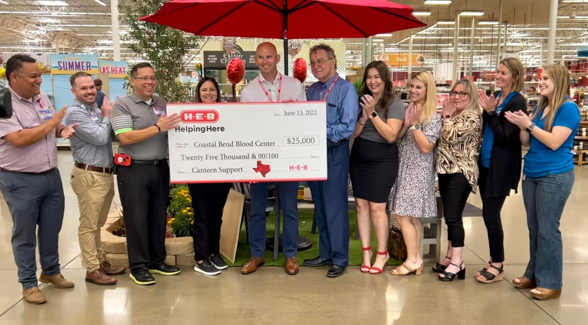 HEB donating check