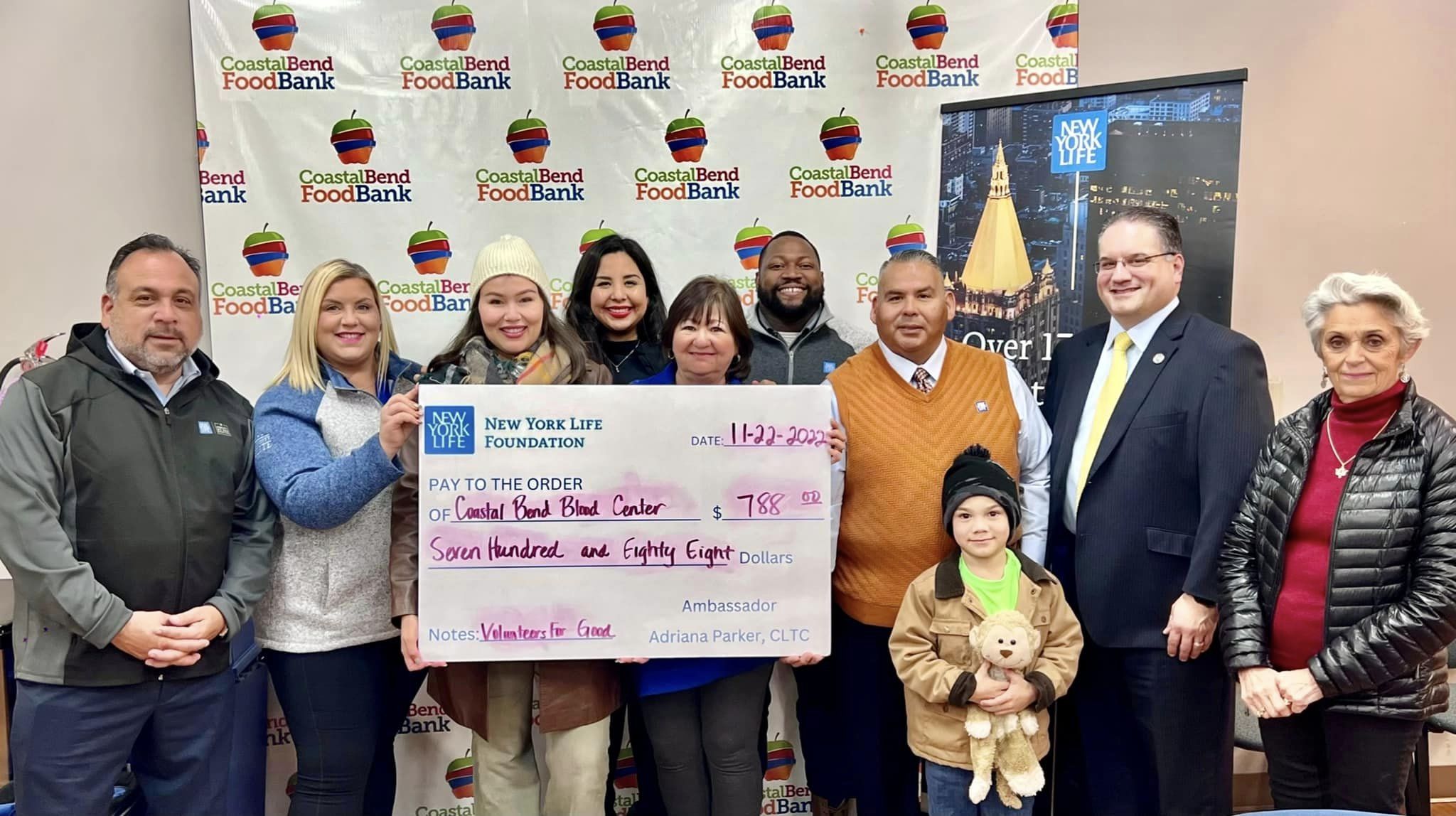 New York Life Foundation Donating Large Check
